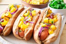 Hot dogs with pineapple, wasabi mayo, jalapenos